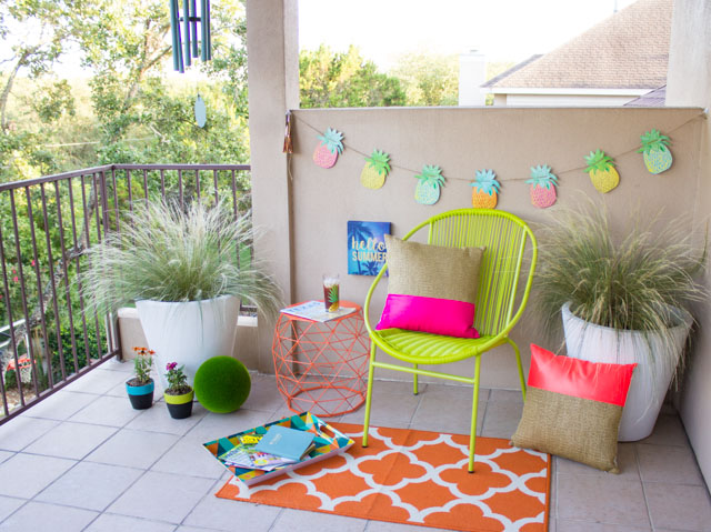 Colorful patio makeover with neon and pineapple accents!