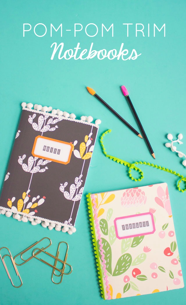 Transform composition notebooks by covering them in vinyl wallpaper scraps and pom pom trim!