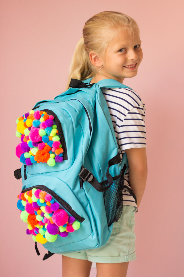 Make a pom-pom backpack for a fun back-to-school craft!