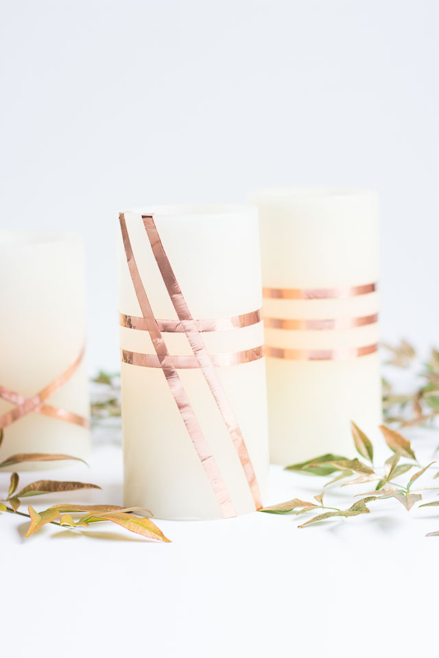 Wrap flameless LED candles with copper foil tape for a gorgeous look - perfect for fall or your Thanksgiving table!