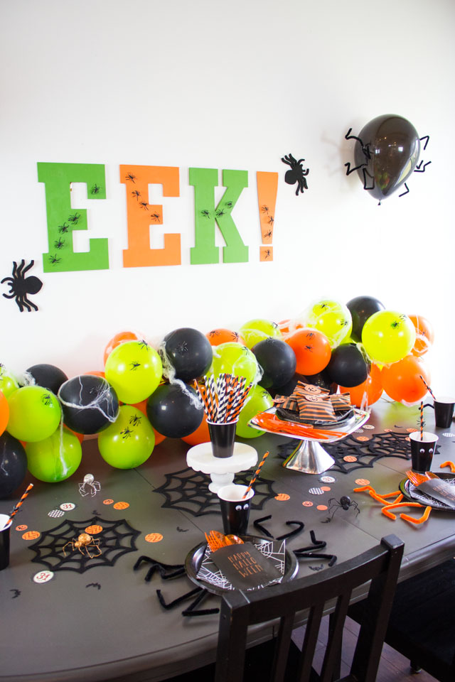 Make this spider-themed Halloween party with inexpensive supplies!