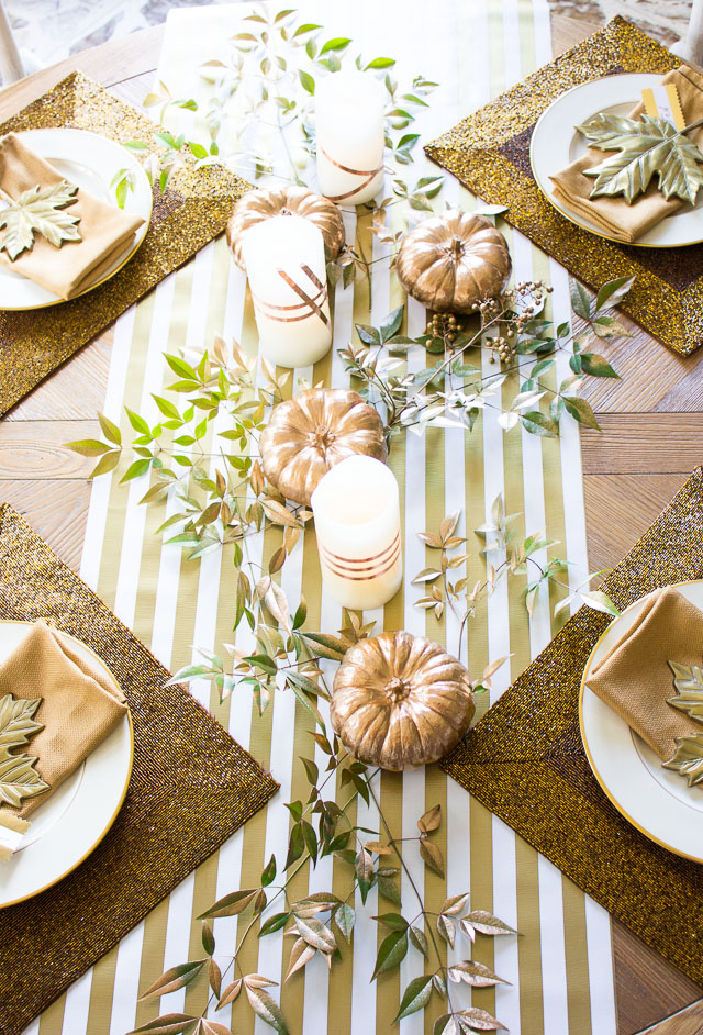Thanksgiving table idea with copper foil wrapped candles!