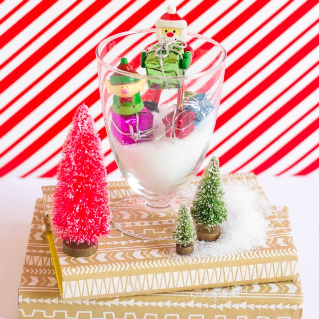 These mini Christmas terrariums are a simple and sweet version to making a snow globe!