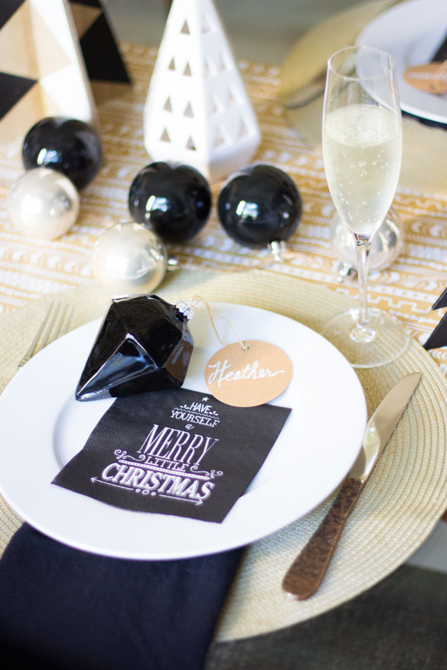Modern Christmas brunch table with black and white ornaments