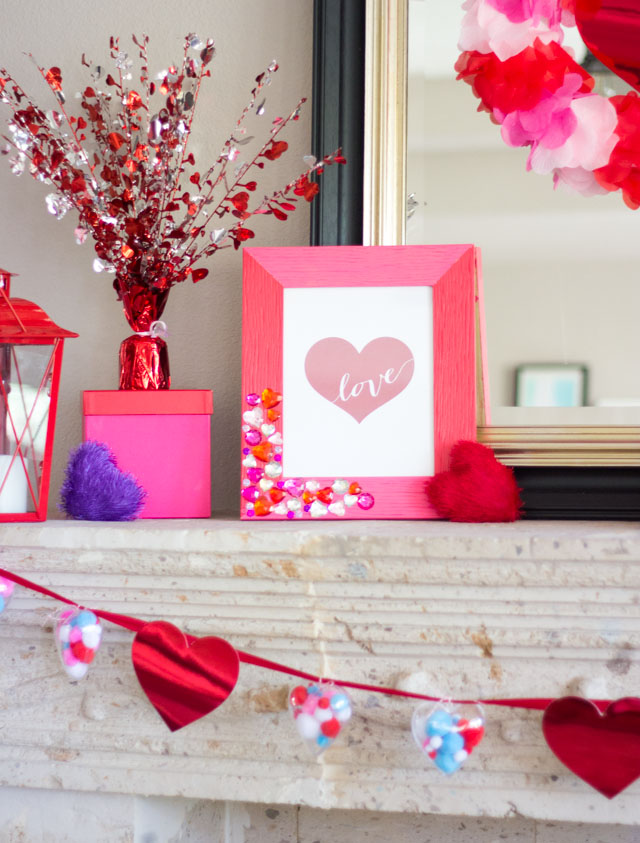 Check out this Valentine Mantel decor bursting with hearts!