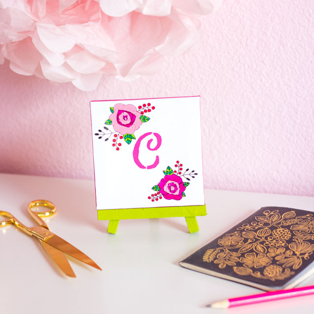 Make this monogram desktop art from mini canvases and floral rub-ons. A perfect personalized Mother's Day or birthday present!