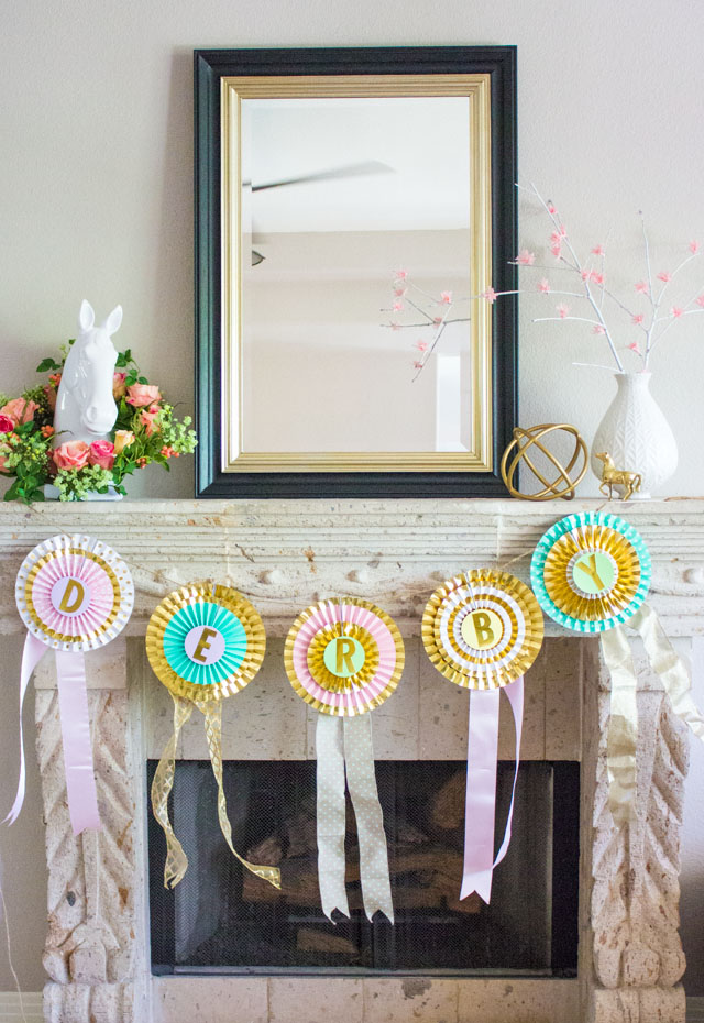 Turn paper party fans into a DIY ribbon banner for your Kentucky Derby party! Turn paper party fans into a DIY ribbon banner for your Kentucky Derby party!