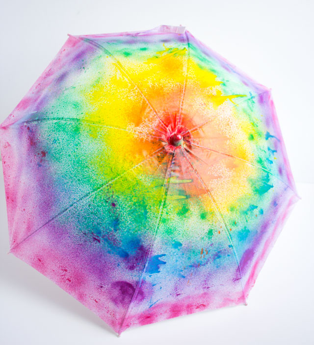 Make DIY kids umbrellas in a rainbow of colors with fabric spray paint!