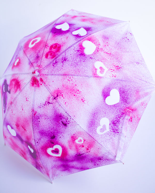 Make DIY kids umbrellas in a rainbow of colors with fabric spray paint!