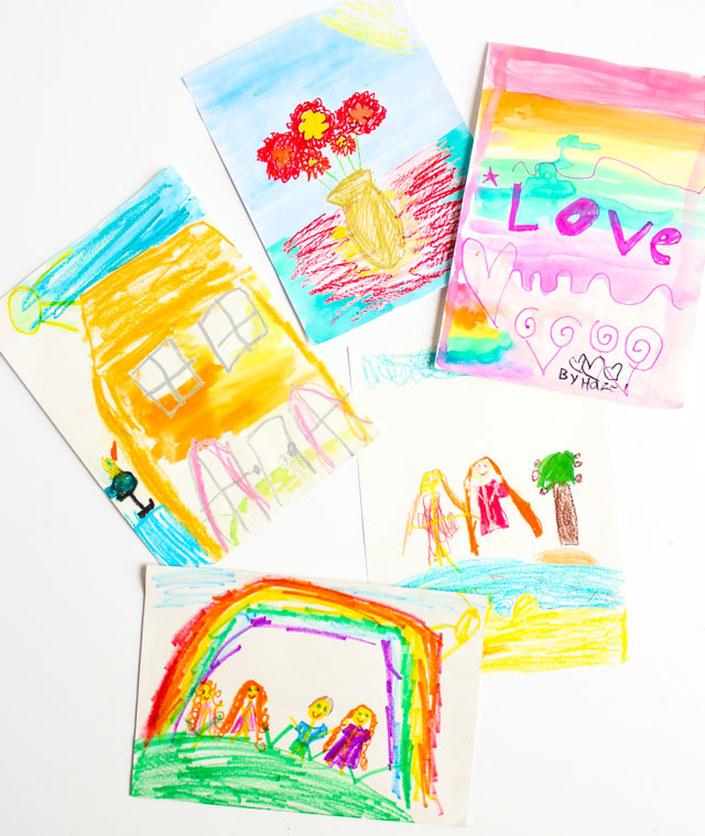 Turn kids art into colorful posters with pom-pom trim frames!