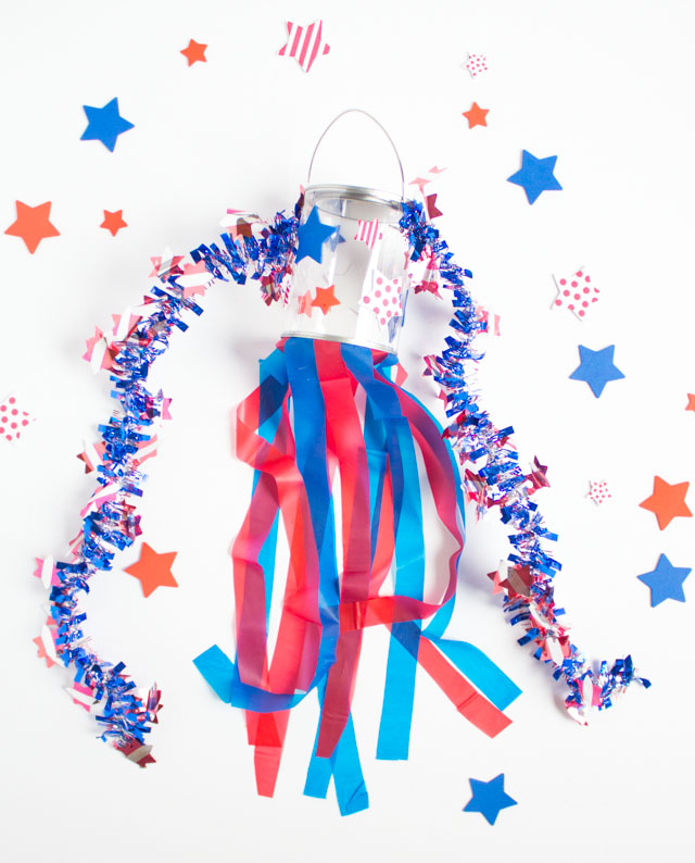 Make these simple patriotic windsocks for the 4th of July with stickers, plastic tablecloths, and a clear paint can. So easy! Make these simple patriotic windsocks for the 4th of July with stickers, plastic tablecloths, and a clear paint can. So easy!