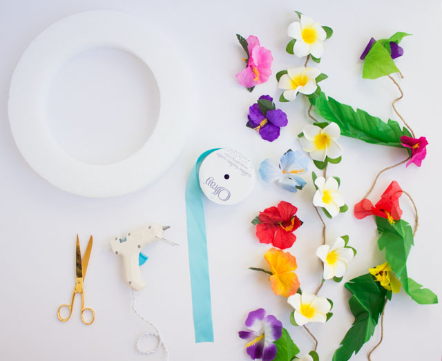 Make this tropical flower wreath for your front door this summer! It would also be perfect for a luau or pool party!