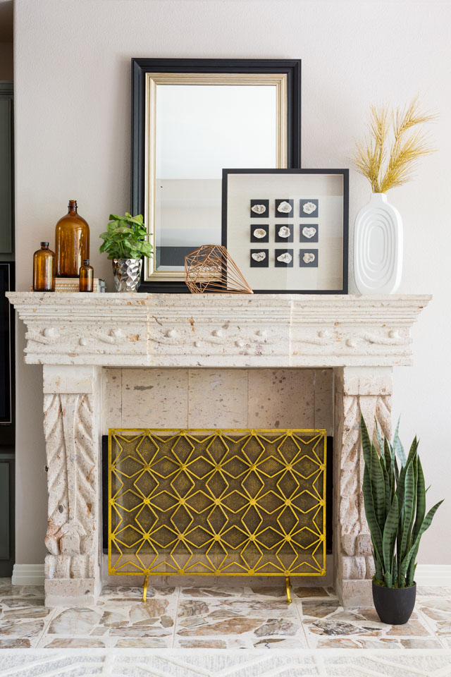 This modern gold screen completely transforms the fireplace!