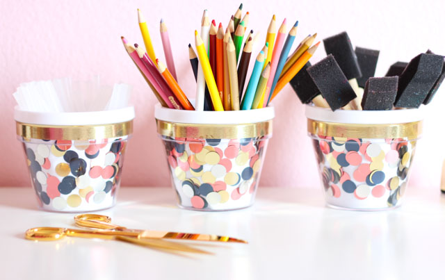 Add some stylish storage to your desktop with these fun DIY confetti desk organizers!