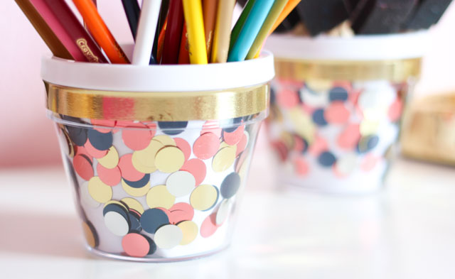 Add some stylish storage to your desktop with these fun DIY confetti desk organizers!