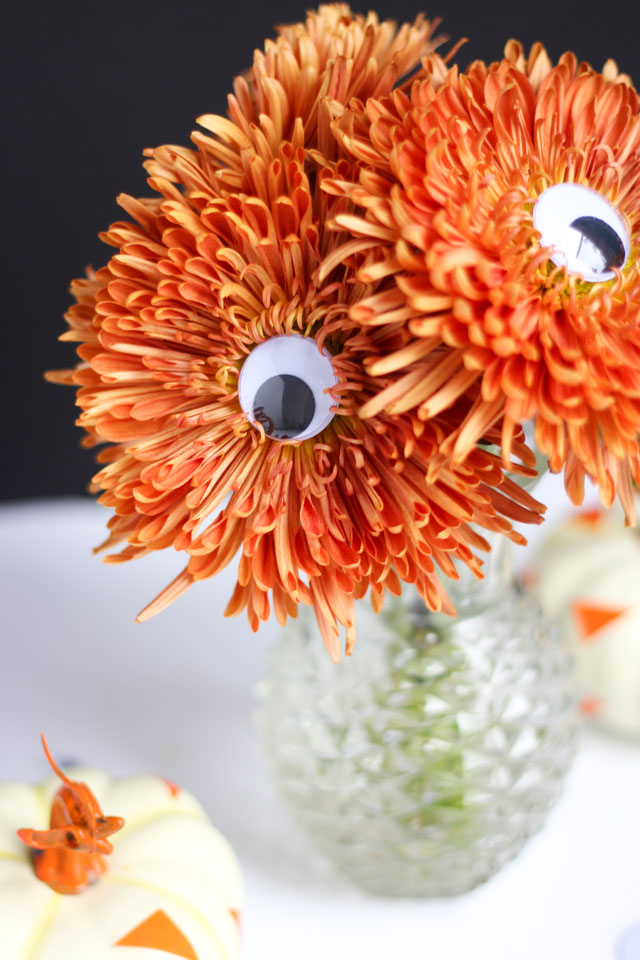 Add googly eyes to mums to make a spooky Halloween bouquet!