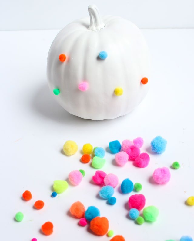Make a polka dot pumpkin in minutes with pom-poms!