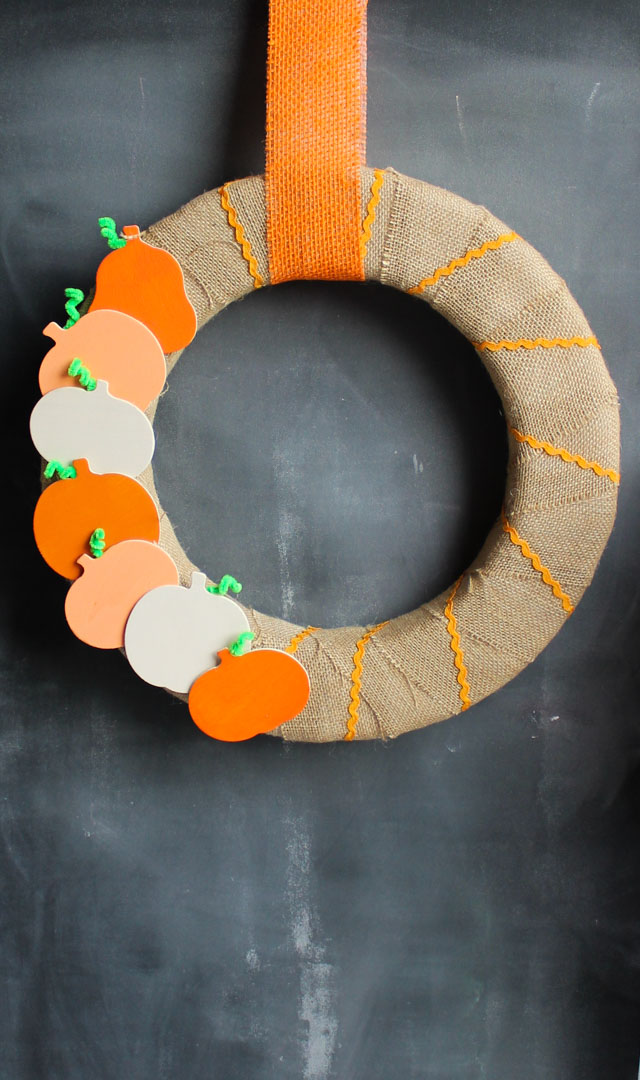 Keep this simple wood and burlap pumpkin wreath up from the beginning of fall through Thanksgiving!