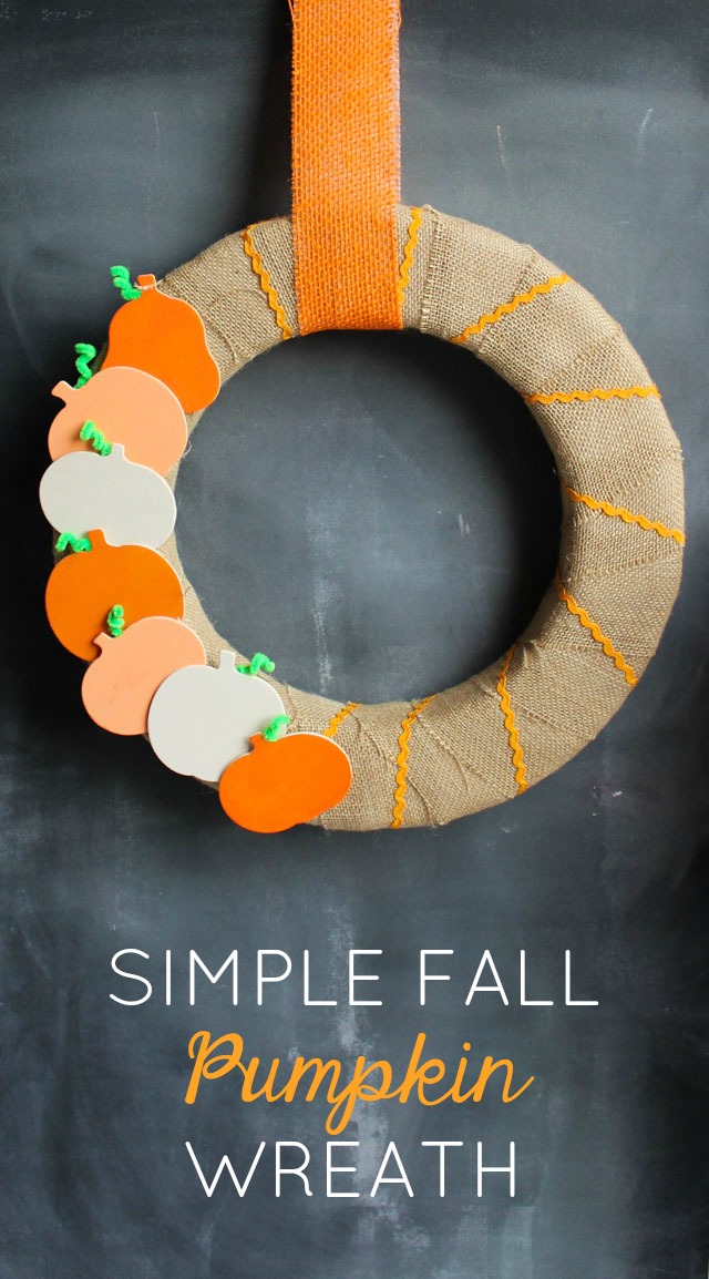 Make this sweet DIY fall pumpkin wreath with painted wood pumpkins and burlap!