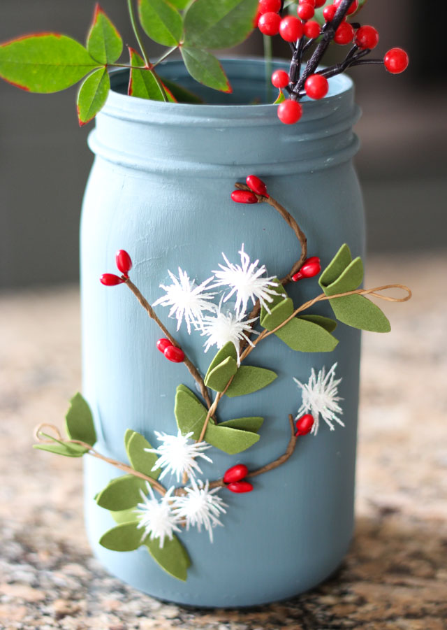 Such a pretty mason jar craft idea - winter floral vases!