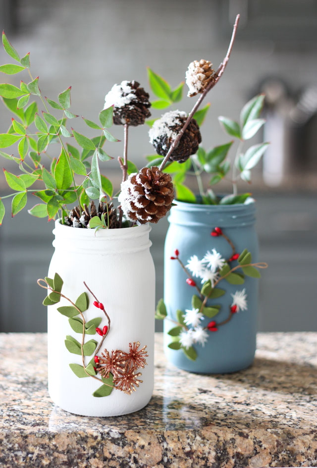 Such a pretty mason jar craft idea - winter floral vases!