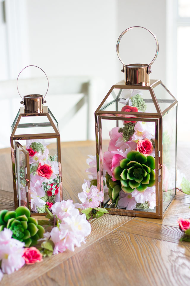 Make these gorgeous floral topiary spring lanterns with faux flowers and foam cones!