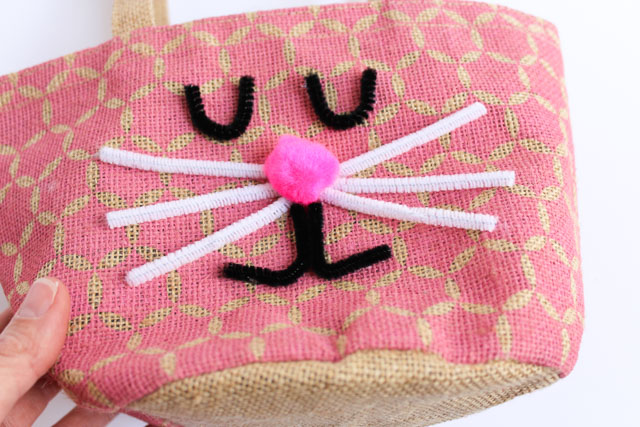 Turn a bag into an bunny Easter basket in under 30 minutes for under $10! #easterbasket #easterbasketideas #bunnybasket
