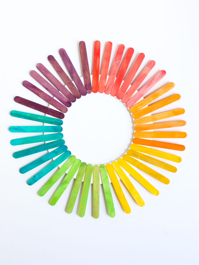 https://designimprovised.com/wp-content/uploads/2018/03/diy-popsicle-stick-rainbow-wreath-5.jpg