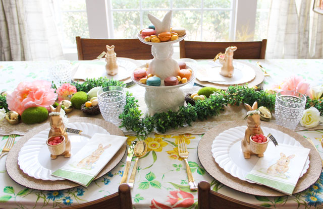 Love this Easter table idea filled with flowers and bunnies! #eastertable #easterbrunch #easterdecor #eastercenterpiece