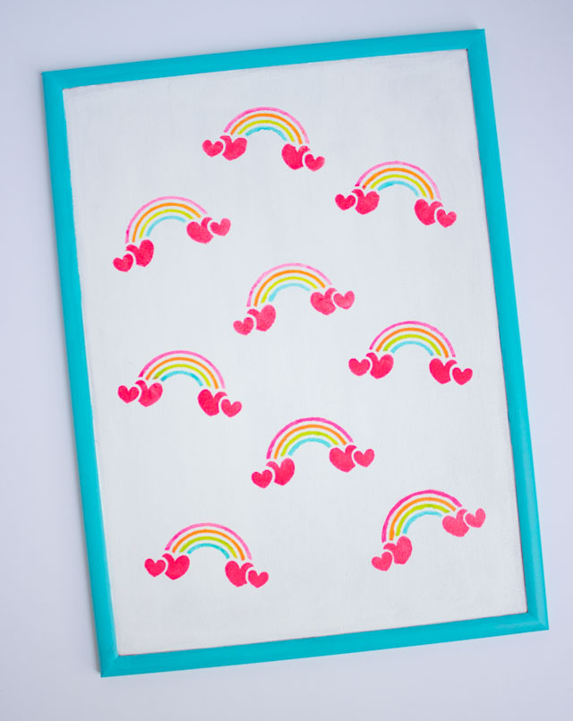 Update a cork board with rainbow stencils! #corkboard #rainbowdecor #kidsdecor