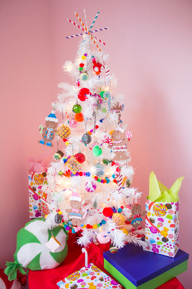 Create a candy and sweet treat themed Christmas tree filled with handmade ornaments with these fun craft ideas! #candytree #themedtree #Christmastree #Christmastreeideas #diyornaments #candyornaments #christmasornaments