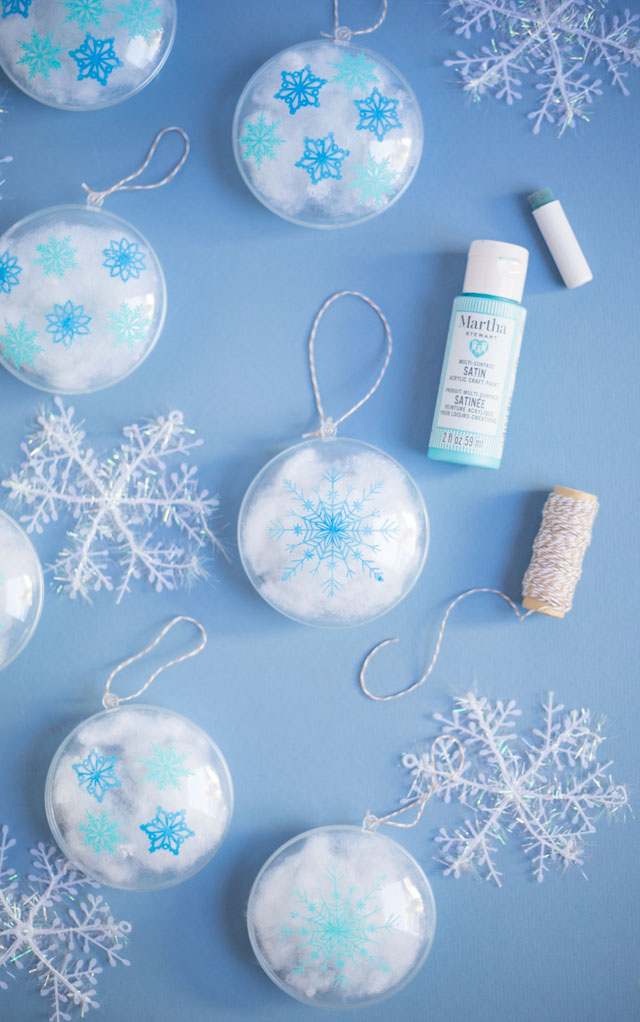 Stencil clear ornaments with snowflakes and fill them with snow! #christmasornaments #snowflakeornaments #clearornaments #marthastewartcrafts #plaidcrafts Stencil clear ornaments with snowflakes and fill them with snow! #christmasornaments #snowflakeornaments #clearornaments #marthastewartcrafts #plaidcrafts