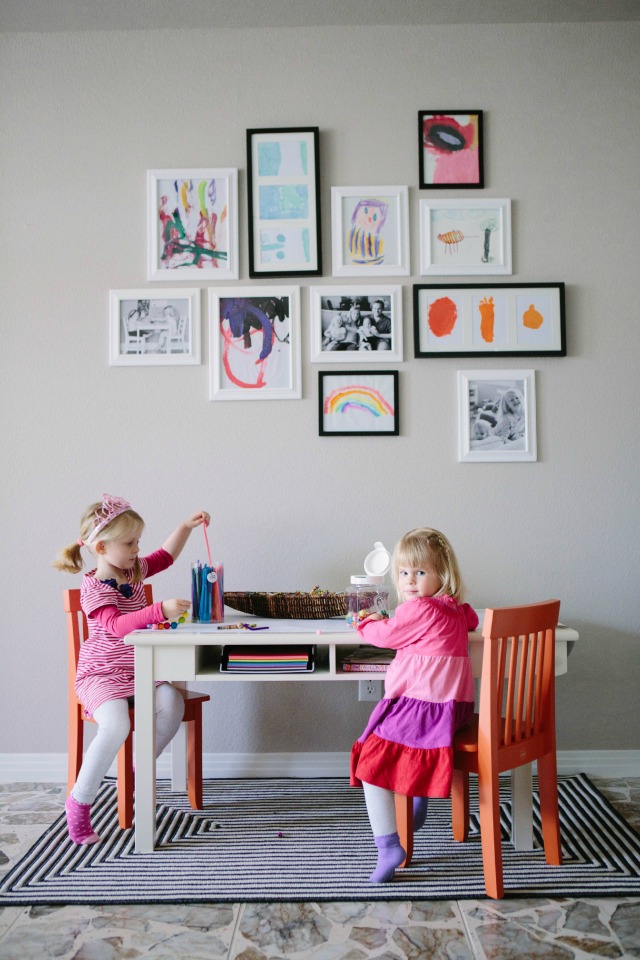 Kids art gallery wall with play table
