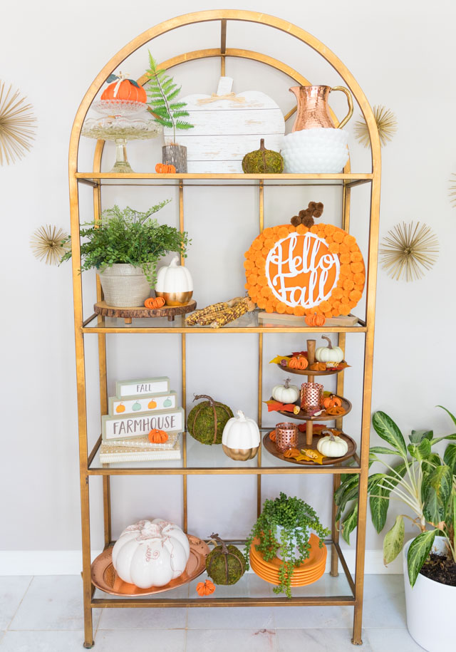 Dining room shelves decorated for fall