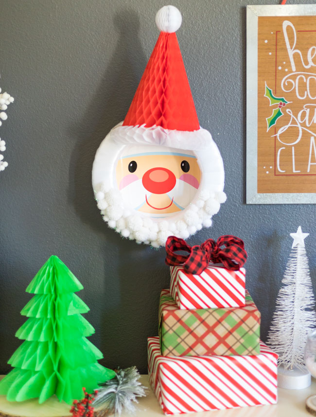 DIY Santa wreath with honeycomb hat and pom-poms