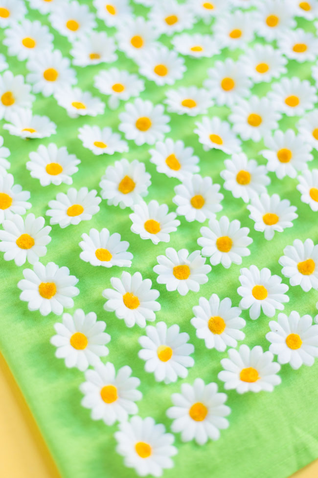 Artificial daisy flowers on a shirt