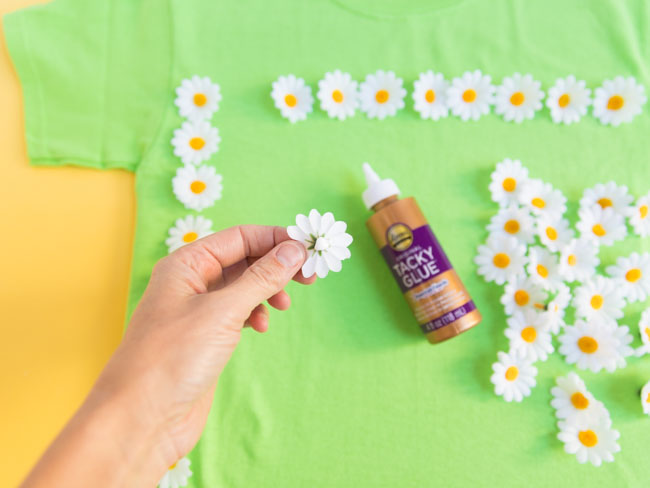 Gluing flowers onto shirt with Aleene's Tacky Glue