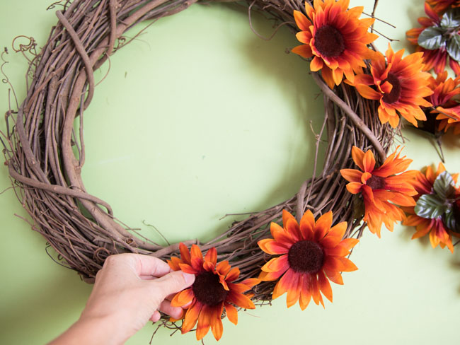 Adding sunflowers to grapevine wreath