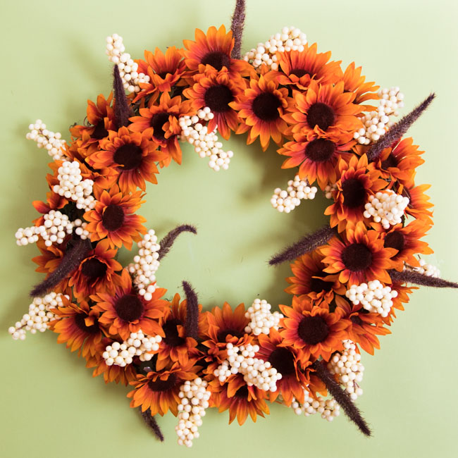 Fall wreath with sunflowers and cattails