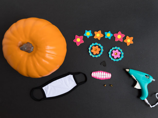 Supplies for Day of the Dead face mask pumpkin