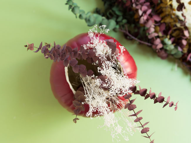 Pumpkin vase with dried flowers