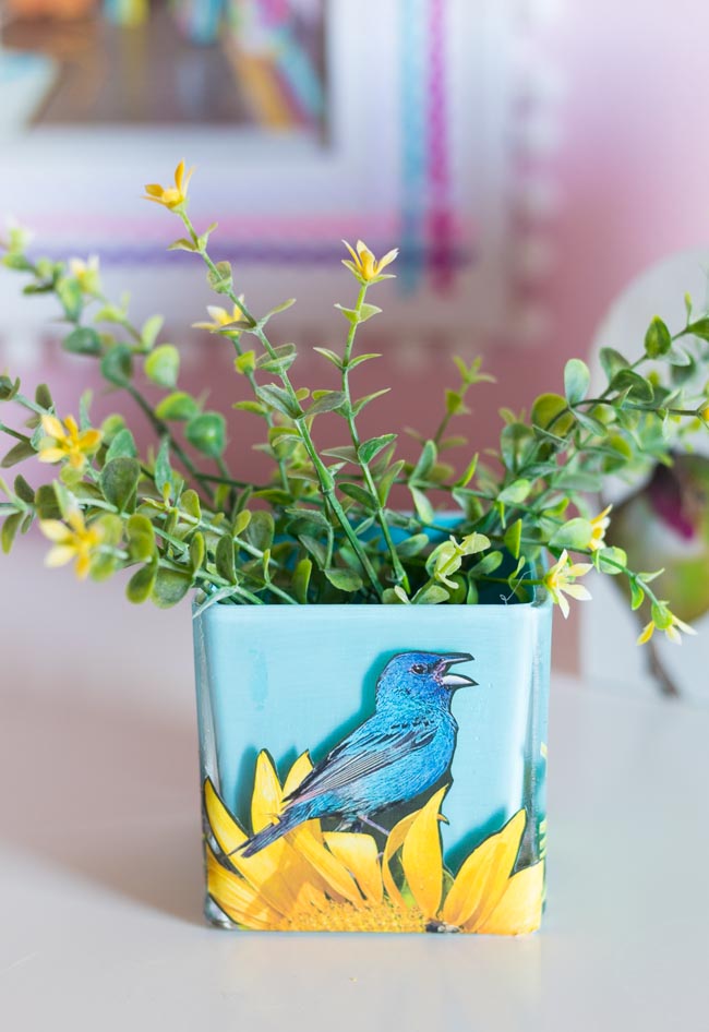 Glass vase painted blue with bird