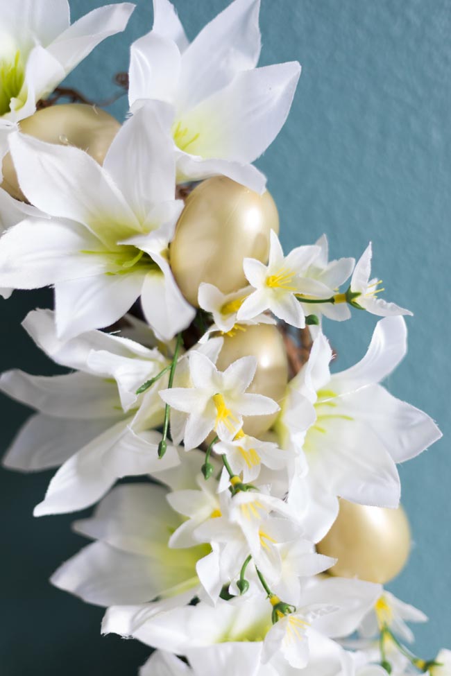 Wreath made with Easter lilies and gold eggs from Dollar Tree