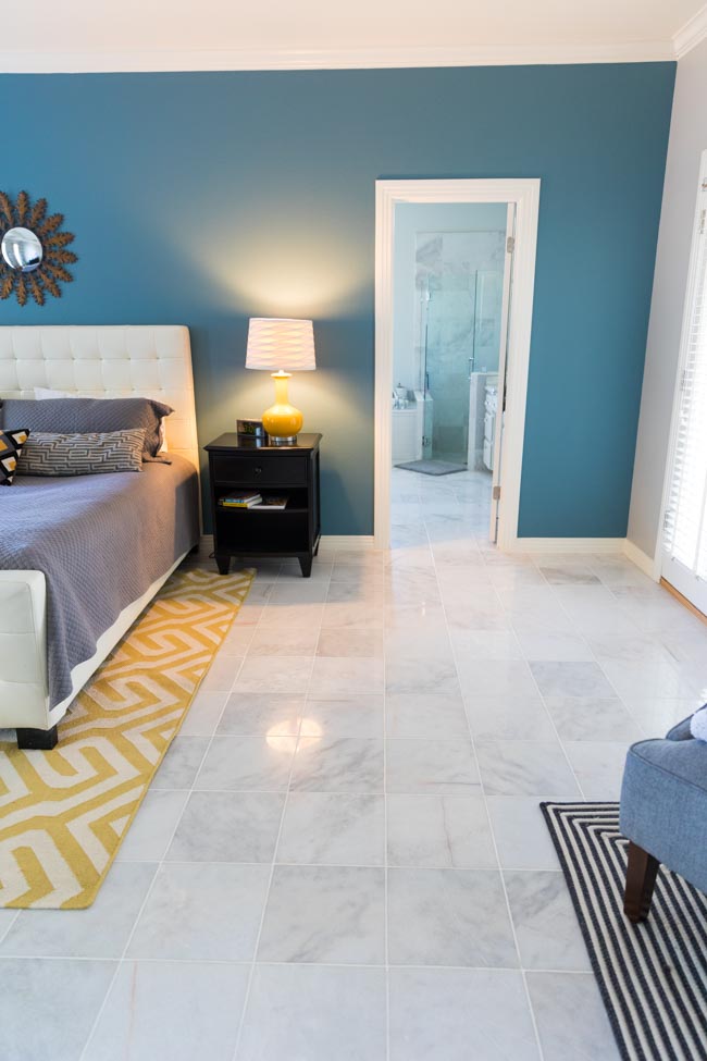 Master bedroom with polished Carrara marble