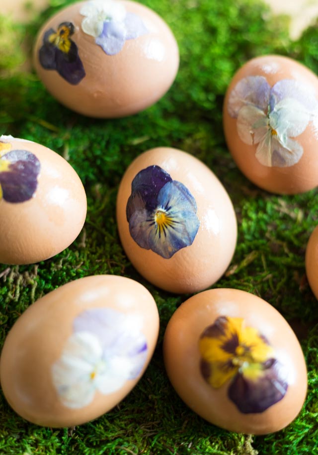 Easter eggs decorated with pressed flowers