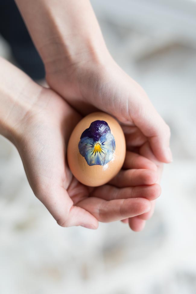 Brown egg decorated with flower