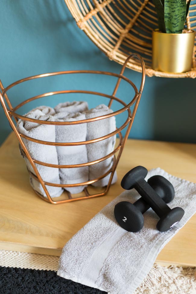 Gym towels rolled and stored in basket