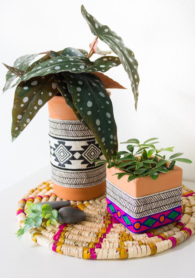 Terracotta planter decorated with boho trim