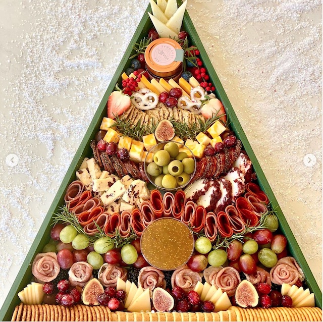 Christmas charcuterie board in triangle platter