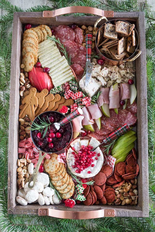 https://designimprovised.com/wp-content/uploads/2022/11/How-to-Make-a-Christmas-Cheese-Board-4.jpg